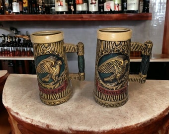 Pair of Napcoware Colonial Inn Steins