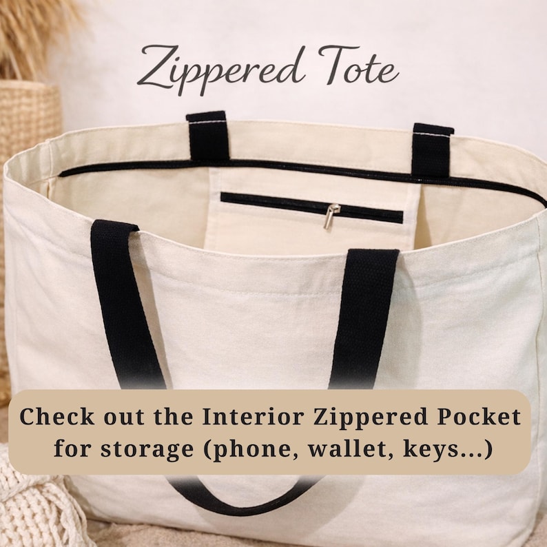 May include: Cream-colored zippered tote bag with black straps. The bag features a black interior zippered pocket. Text on the image reads "Zippered Tote" and "Check out the Interior Zippered Pocket for storage (phone, wallet, keys...)".