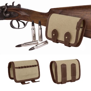 May include: A hunting rifle with a wooden stock, silver bullets, and a tan canvas and brown leather cartridge holder. The image also shows the cartridge holder from different angles. The cartridge holder is tan and brown.