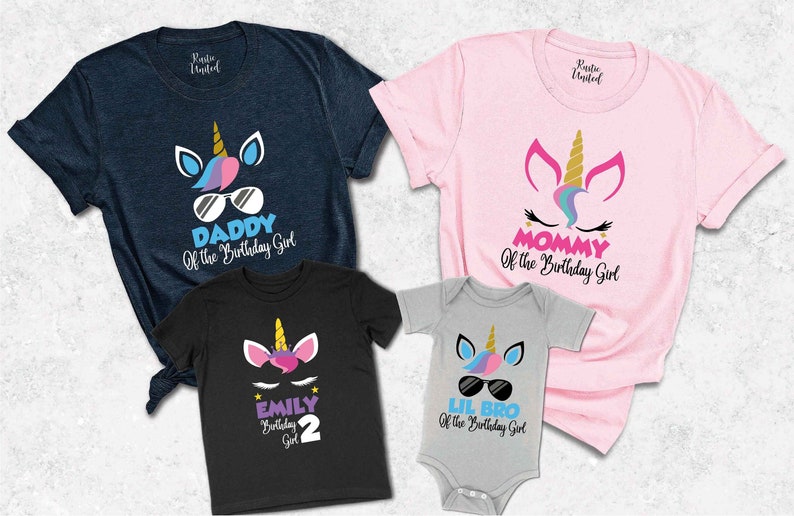 May include: A set of four t-shirts featuring a unicorn design. The shirts are in different colors and have text that says "Daddy of the Birthday Girl", "Mommy of the Birthday Girl", "Lil Bro of the Birthday Girl", and "Emily Birthday Girl 2".