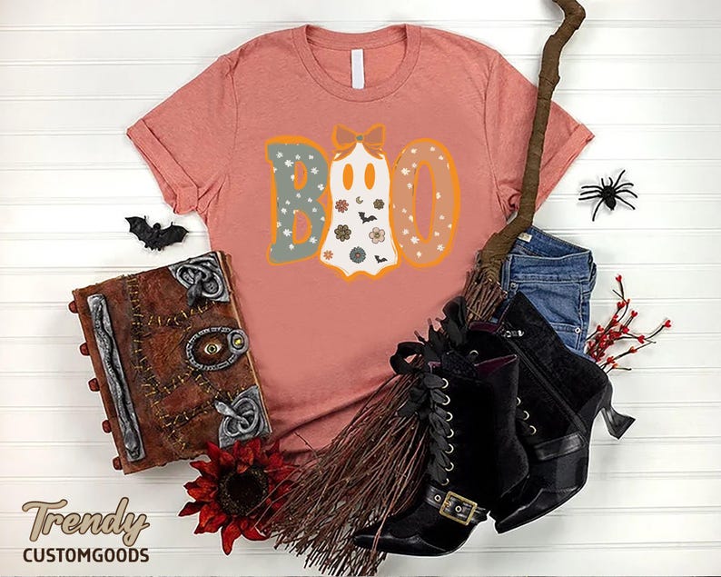 a t - shirt with the word boo on it