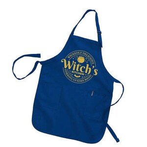 May include: A blue kitchen apron with a yellow circle design that says "Wickedly Delicious Witch's Kitchen Stirring Up Some Magic".