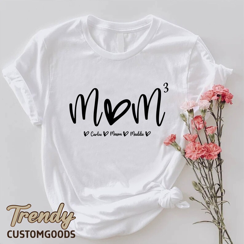 a white shirt with the word mom written on it