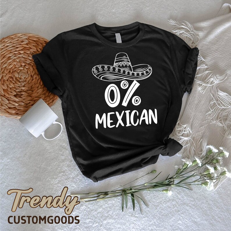 a black t - shirt with the words 70 % mexican on it