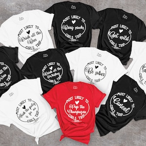 May include: Nine white and black t-shirts with a circle design and text that says "Most Likely To" followed by a phrase. The phrases are "Drink all the Wine", "Drink all the Beer", "Drink all the Whiskey", "Pop the Champagne", "Bring Snacks", "Be Sober", "Get Wild", "Cancel", and "Get Hitched".