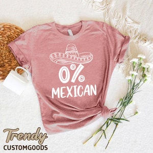 a t - shirt with the words 70 % mexican on it