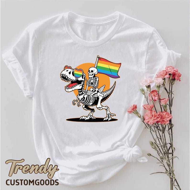 a t - shirt with a skeleton holding a rainbow flag