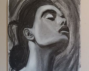 Original charcoal drawing, portrait, head study of a pretty young woman in movement, decorative art, figurative portrait of a beautiful woman