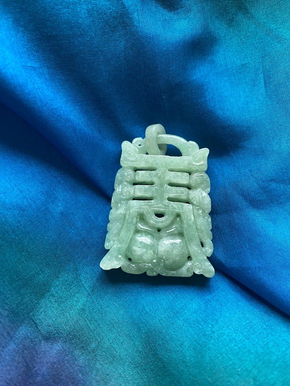 Carved Green Jade Pendant