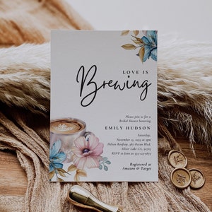 May include: A bridal shower invitation with a watercolor illustration of a cup of coffee, flowers, and leaves. The text reads "Love is Brewing" and includes the bride's name, date, time, and location. The invitation also includes information about the RSVP and where to register gifts.