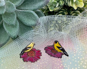 Male and Female Goldfinch on Purple Coneflower
