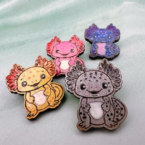 Adorables pendientes o broches de ajolote