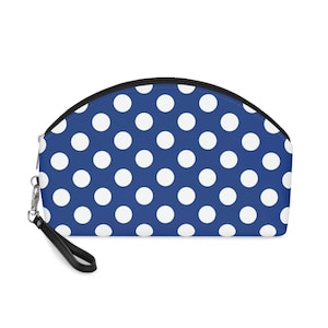 Bolsa de viagem para maquiagem azul com bolinhas brancas