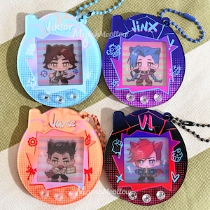Jinx Lenticulaire Pocket Pet Charms - Arcane acryl sleutelhangers- Jinx Vi Viktor-sleutelhanger