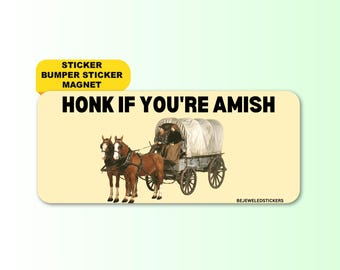 May include: A yellow and black sticker with the text "Honk if you're Amish" and a picture of a horse-drawn carriage. The sticker is for a car bumper or magnet.