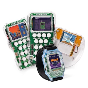 May include: A group of transparent green electronic devices with screens, buttons, and the word "CHATTER" printed on them. One device is a smartwatch with a black strap, displaying the time. The screens show various graphics and interfaces.