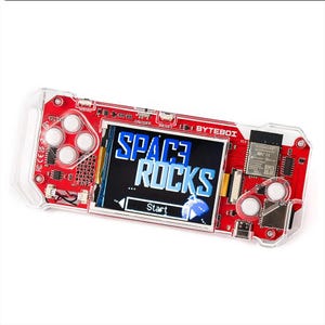 May include: A red Byteboi handheld gaming device with a clear plastic case. The screen displays the words "SPACE ROCKS" in blue and white. The device has buttons and a directional pad.