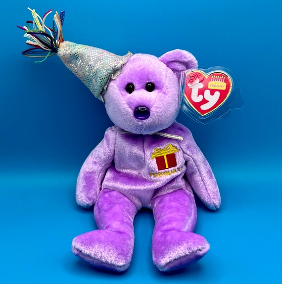 TY Beanie Baby FEBRERO el osito de cumpleaños de peluche (con sombrero) (9,5 pulgadas)