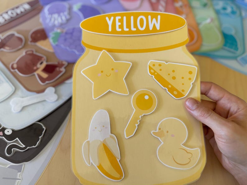 Yellow color sorting jar and its cut-outs attached