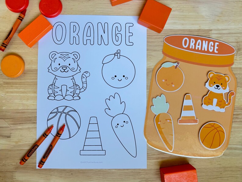 Orange color matching jar with its cut-out pieces placed on it and its coloring page on the left side