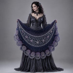 May include: A semi-circular crochet shawl featuring a dark navy blue and purple gradient with intricate floral patterns and scalloped edges. The shawl is displayed over a long-sleeved, dark gray lace gown with a sweetheart neckline and lace collar.