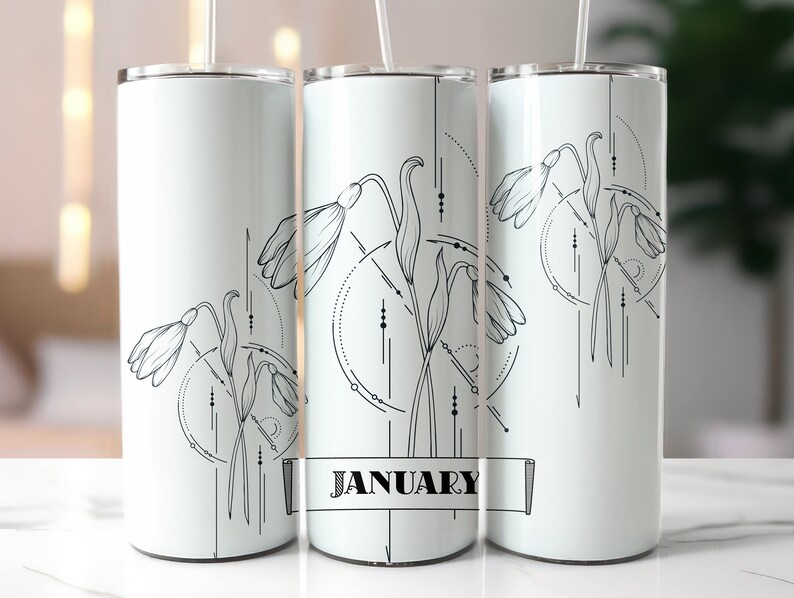 May include: White stainless steel tumbler featuring a black and white illustration of snowdrops and geometric designs. The tumbler has a black banner with the word "JANUARY" printed on it.