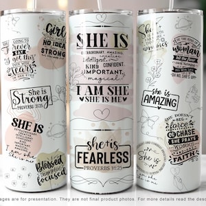 May include: Three white tumblers with pink and black designs and inspirational quotes. The quotes include "She is Strong", "She is Fearless", and "She is Amazing".