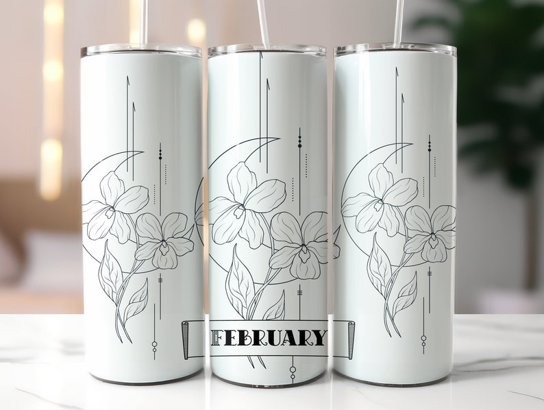 May include: Three white stainless steel tumblers with black floral designs and the word "FEBRUARY" on the middle tumbler.