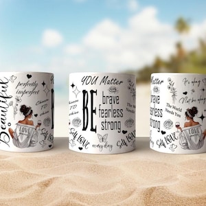 May include: Three white ceramic mugs with black text and illustrations. The mugs feature inspirational messages such as "You Matter", "Be Brave Fearless Strong", and "Beautiful Perfectly Imperfect".