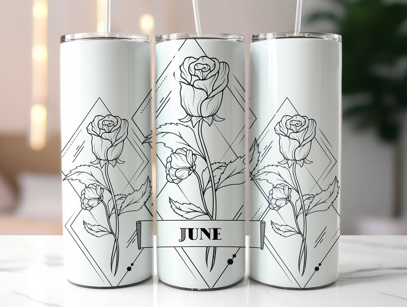 May include: Three stainless steel tumblers with a white background and black line drawings of roses and geometric shapes. The middle tumbler has the word "JUNE" printed on it.