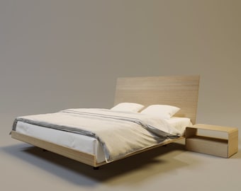 Puede incluir: Una cama moderna con cabecero de madera clara y mesita de noche a juego. La cama tiene un colchón blanco, almohadas y una manta de color claro. El marco de la cama mide aproximadamente 200 cm de largo.