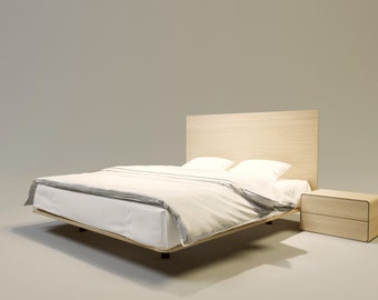 Puede incluir: Un juego de dormitorio moderno con una estructura de cama, cabecero y mesita de noche de madera clara. La cama está hecha con ropa de cama blanca y una manta gris. Se ven dos almohadas blancas. La mesita de noche tiene dos cajones.