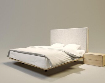 Puede incluir: Una cama moderna con cabecero de color claro y mesita de noche a juego. La cama tiene un marco de madera de color claro y ropa de cama blanca con ribete gris. La mesita de noche tiene dos cajones.