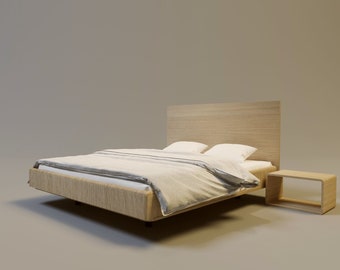 Puede incluir: Una cama moderna con cabecero de madera clara y mesita de noche a juego. La cama está hecha con una tela de color claro e incluye dos almohadas blancas. La ropa de cama tiene una paleta de colores neutros, creando una estética minimalista.