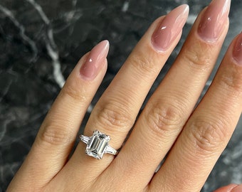 Emerald Cut 4.50 carat Rare D Color VVS2 Clarity IGI Certified Lab Grown Diamond Three Stone Engagement Ring, Side Baguettes 18k Gold