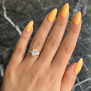 Oval 2.5 carat IGI Certified D Color VVS2 Clarity Lab Grown Diamond Three Stone Engagement Ring, Side Pear Diamonds, 14k Gold