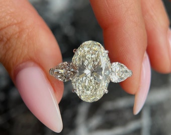 7カラットオーバルE/VVS2クラリティIGI認定合計8カラットラボグロウン