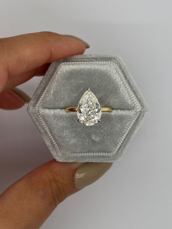 4 carat pear sale shaped diamond ring
