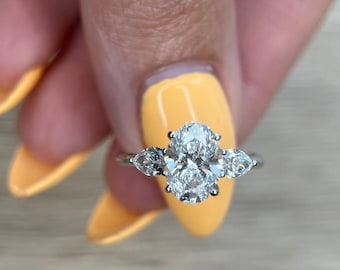 Oval Cut 2 carat IGI Certified D Color VVS2 Clarity Lab Grown Diamond Three Stone Engagement Ring, Side Pear Diamonds, Handmade of 14k Gold