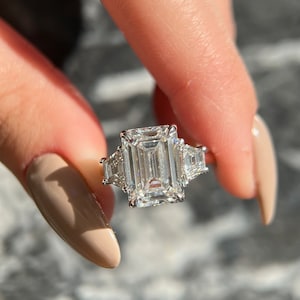 Emerald Cut 6 carat IGI Certified D Color VVS2 Clarity Lab Grown Diamond Three Stone Engagement Ring, Side Trapezoids, Handmade of 18K Gold