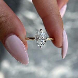 Unique Compass Set Two Tone 14k Gold Oval 2 carat IGI Certified E color VVS2 clarity Lab Grown Diamond Solitaire Hidden Halo Engagement Ring
