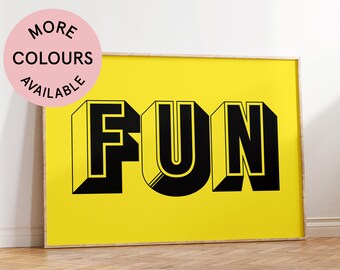 May include: A framed print with a yellow background and the word "FUN" in black, 3D-style lettering.