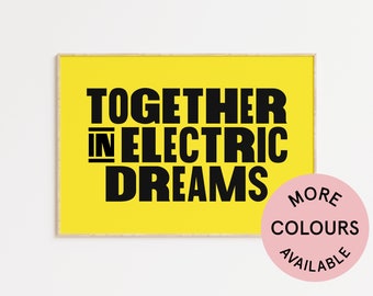 May include: A yellow poster with black text that reads "Together in Electric Dreams". A pink circle with black text that reads "More Colours Available" is in the lower right corner.