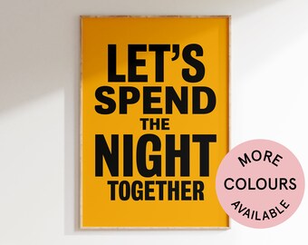 May include: A yellow poster with black text that reads "Let's Spend the Night Together". A pink circle with black text that reads "More Colours Available" is in the lower right corner.