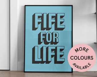May include: A framed poster with a blue background and black text that reads "FIFE FOR LIFE". A pink circle with black text that reads "MORE COLOURS AVAILABLE" is in the lower right corner of the image.