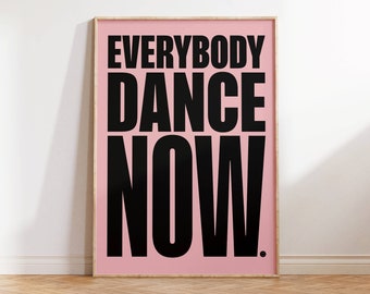 May include: A pink poster with the text "EVERYBODY DANCE NOW" in black bold letters.