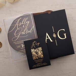 Clear acrylic wedding invitation with rose gold foil, black sleeve envelope and optional QR RSVP card displayed with wax seals.