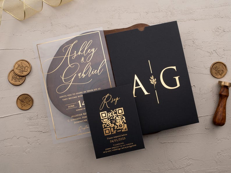 Clear acrylic wedding invitation with rose gold foil, black sleeve envelope and optional QR RSVP card displayed with wax seals.