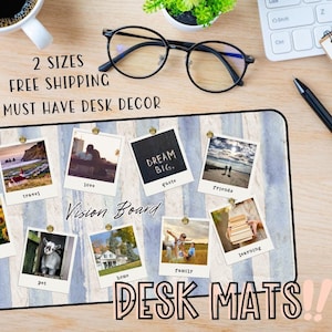 May include: A blue and white striped desk mat with a vision board design. The mat features a variety of images, including a church, a couple, a sunflower field, a goat, a house, a family, and a stack of books. The text "Vision Board" is written in white on a black background.