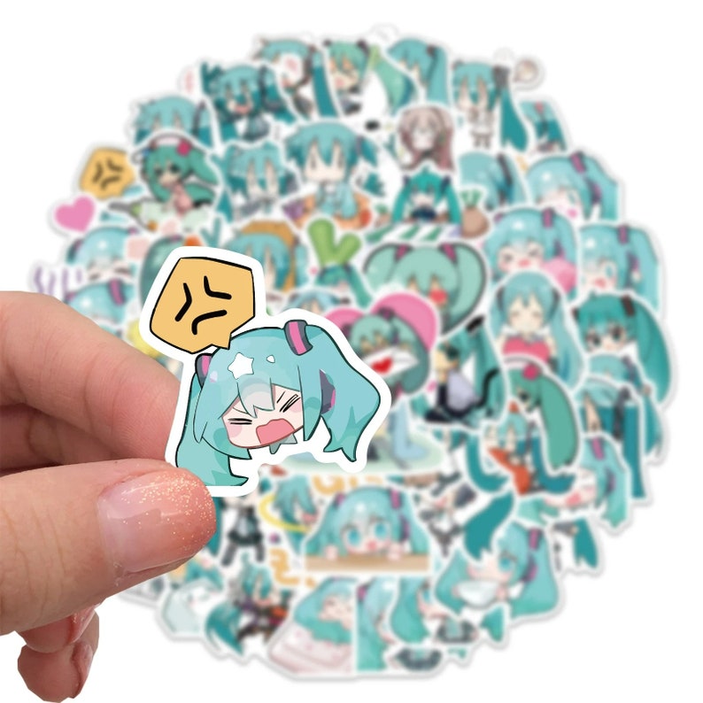 May include: A sheet of stickers featuring various illustrations of a cartoon character with blue hair and a green dress. The stickers are on a white background.